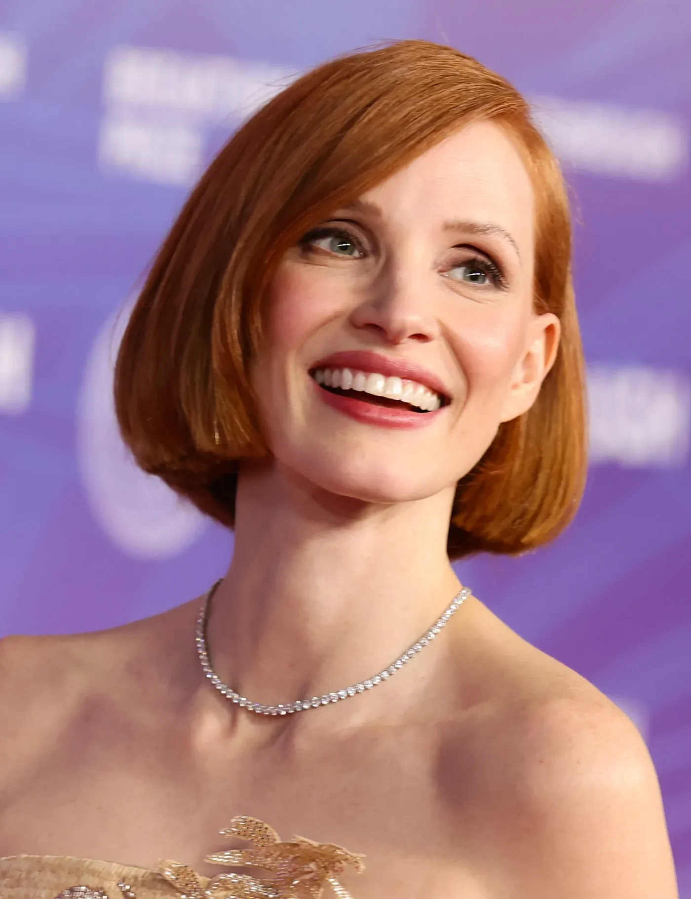 Jessica Chastain smiling at an event
