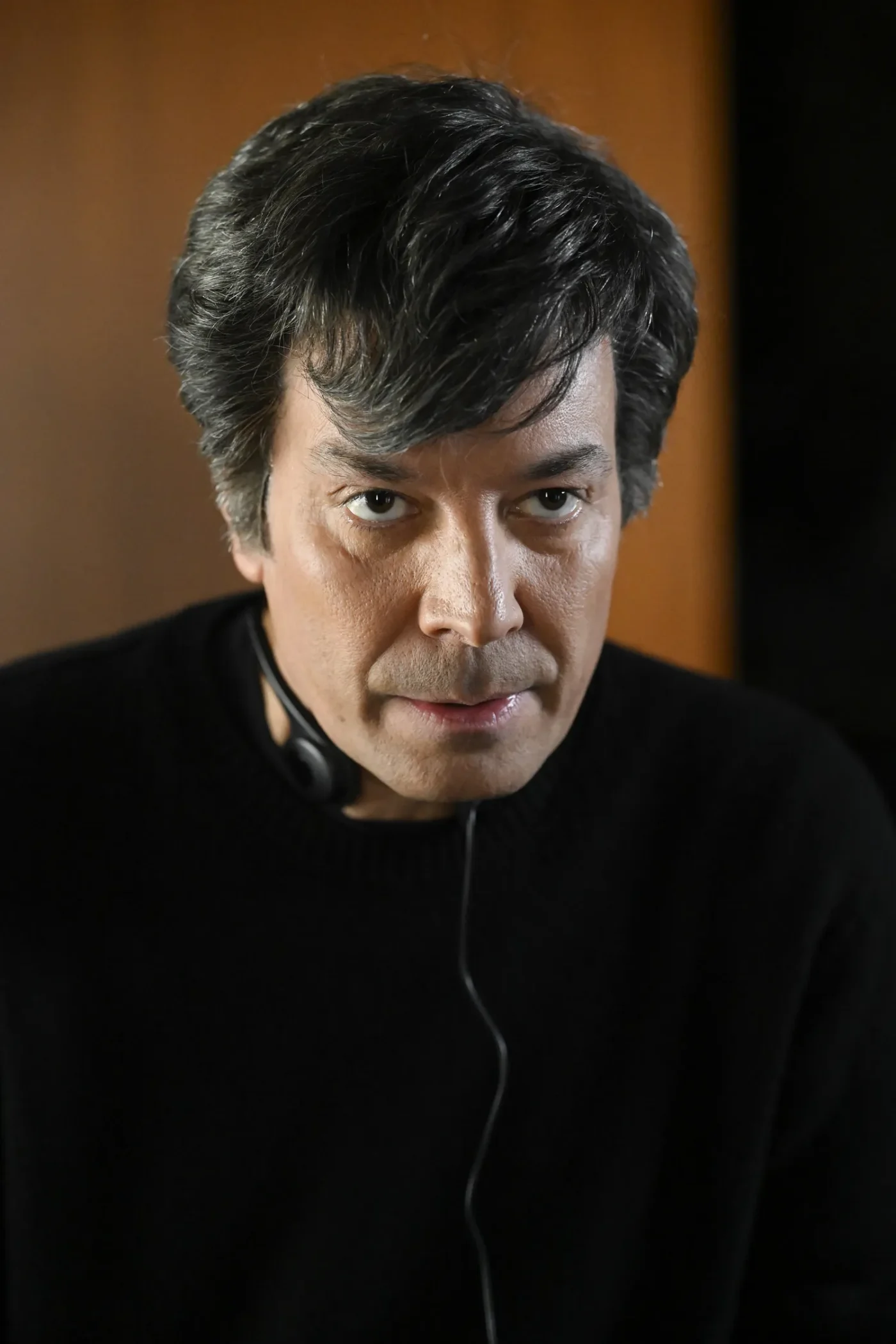 Jimmy Fallon with gray hair as Nathan Fielder