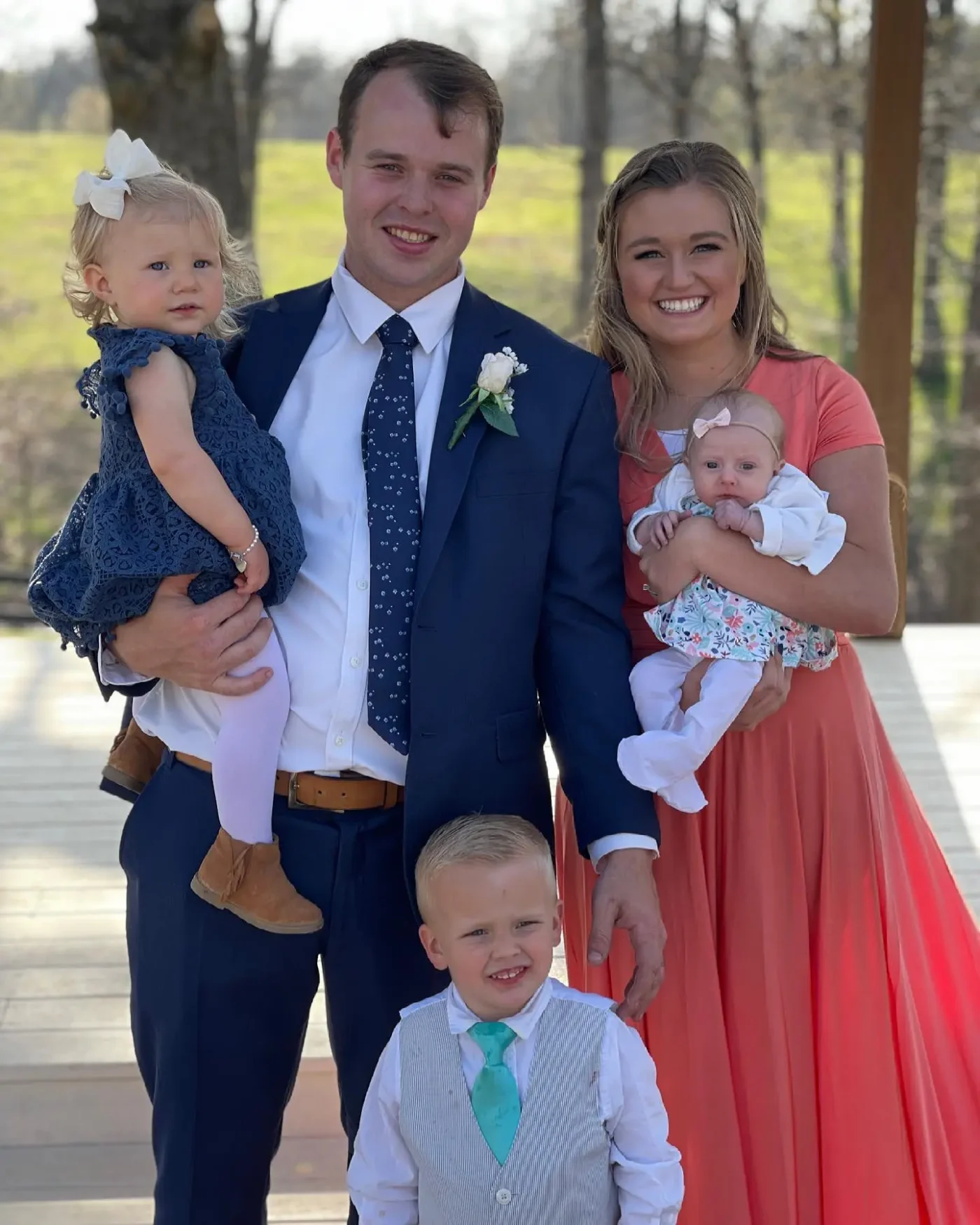 Joseph and Kendra Duggar and family outdoors.