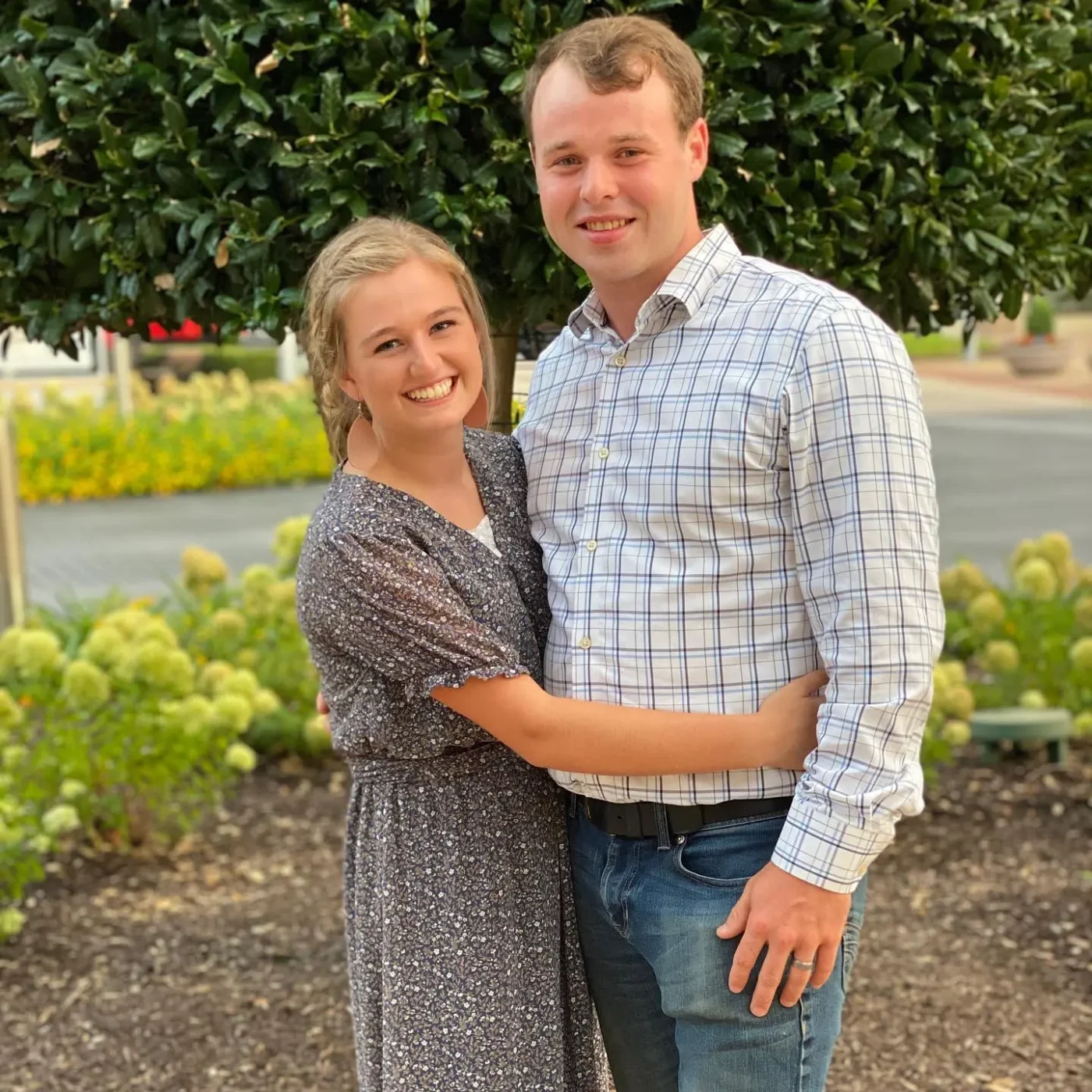 Joseph and Kendra Duggar standing together outside.