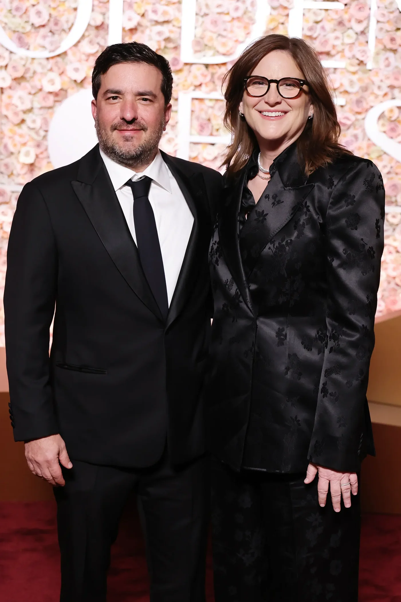 Josh Greenstein and Dana Goldberg at the 83rd Annual Golden Globe Awards.