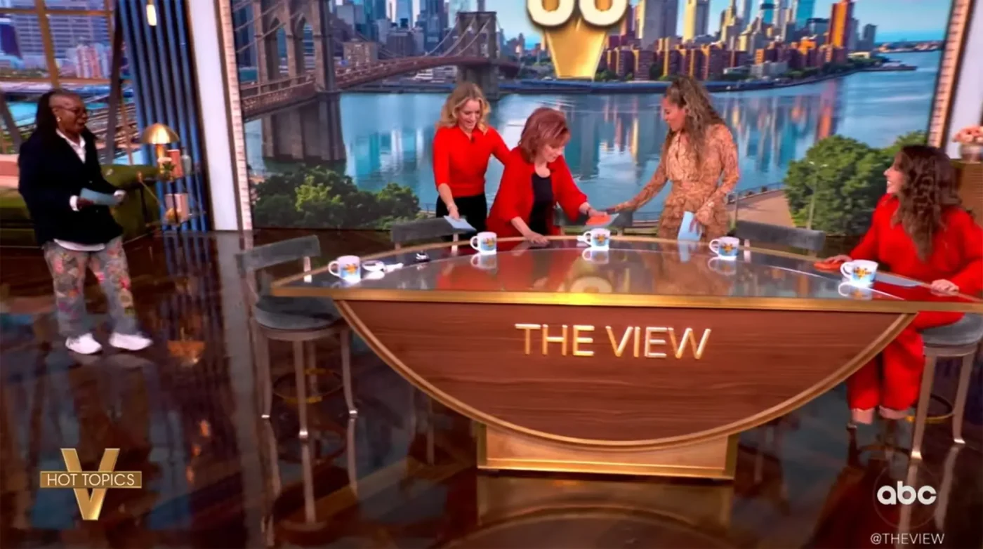 Joy Behar leans on Sara Haines as she returns to