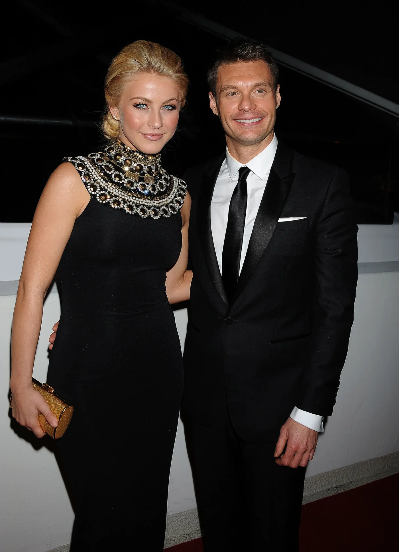 Julianne Hough and Ryan Seacrest arrive at an awards after party.