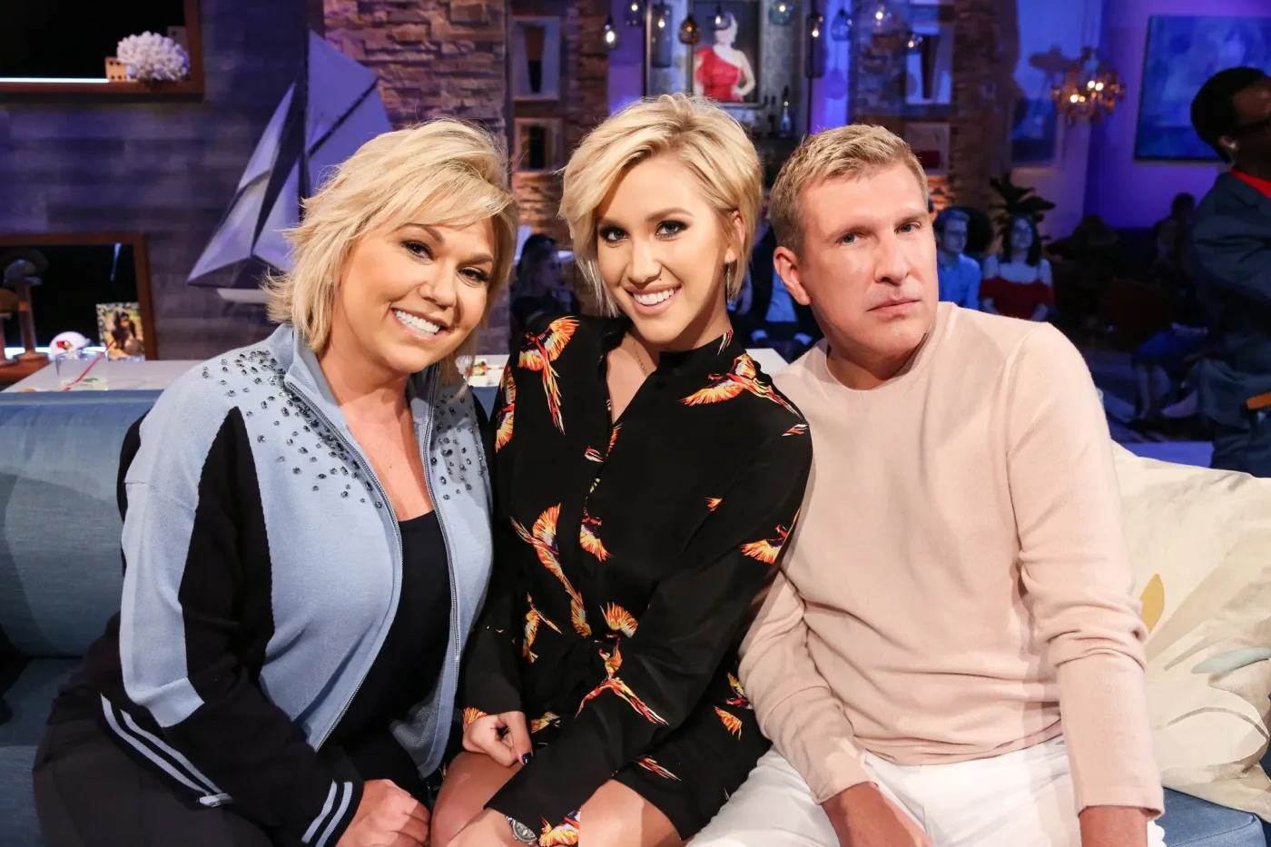 Julie Chrisley, Savannah Chrisley, and Todd Chrisley on Hollywood Game Night.