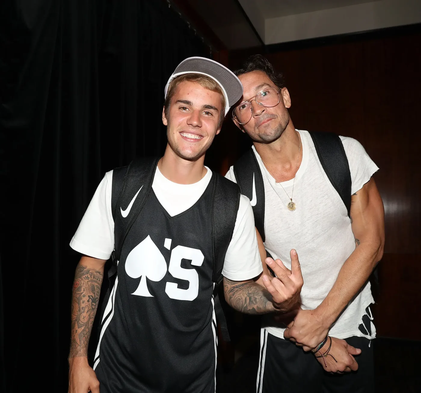 Justin Bieber and Carl Lentz at the Aces Charity Celebrity Basketball Game.