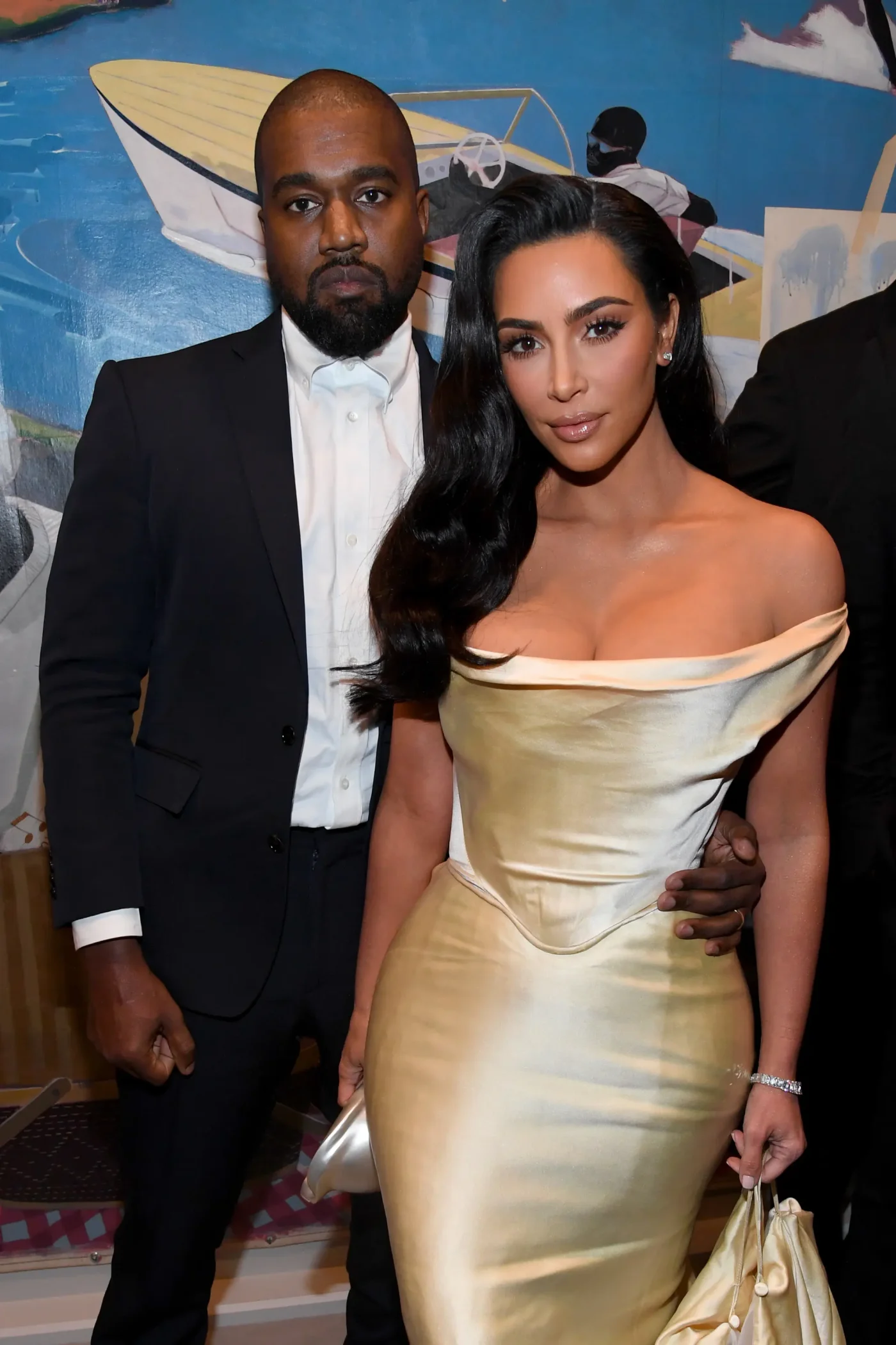 Kanye West and Kim Kardashian attending an event together.