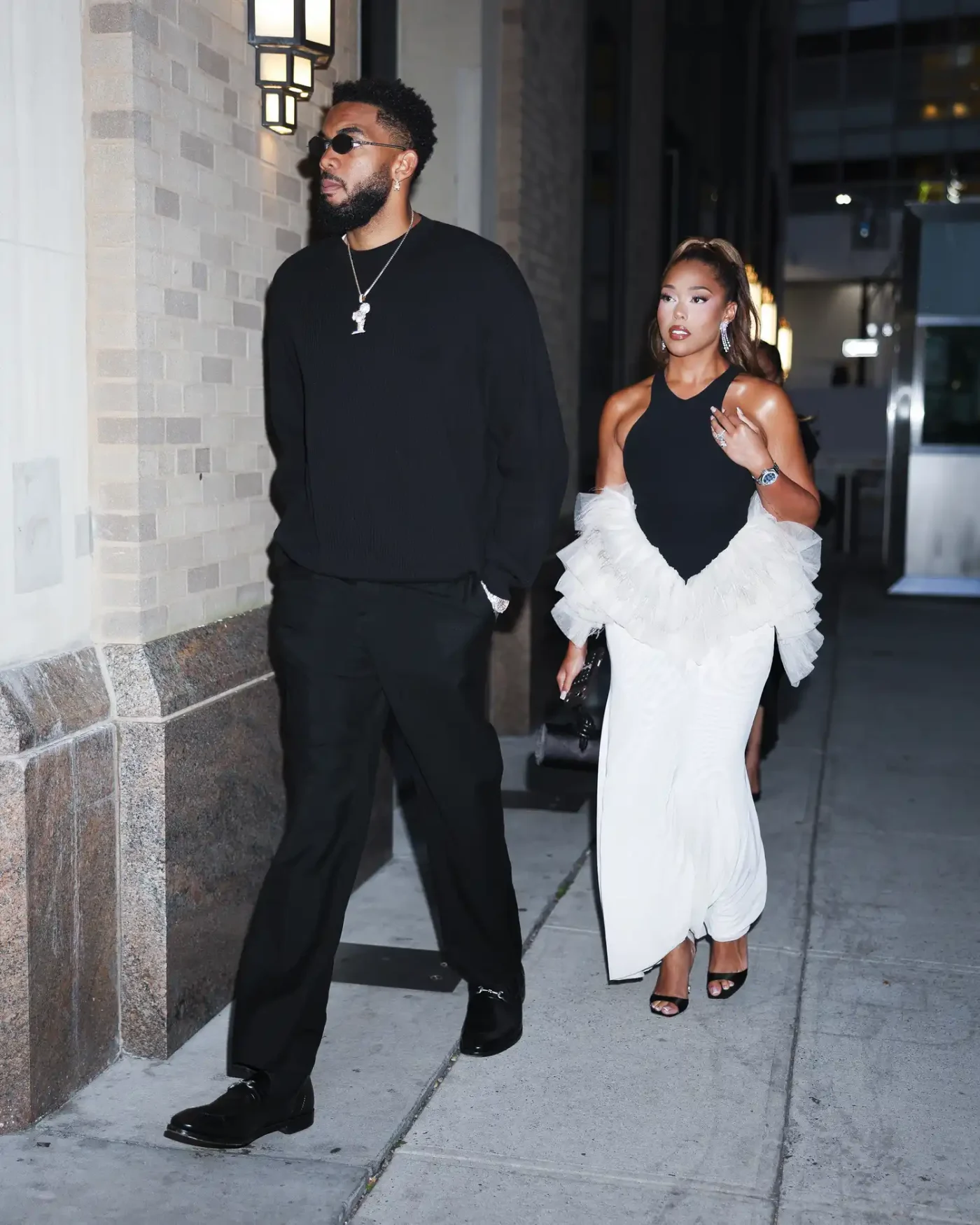 Karl-Anthony Towns and Jordyn Woods outside