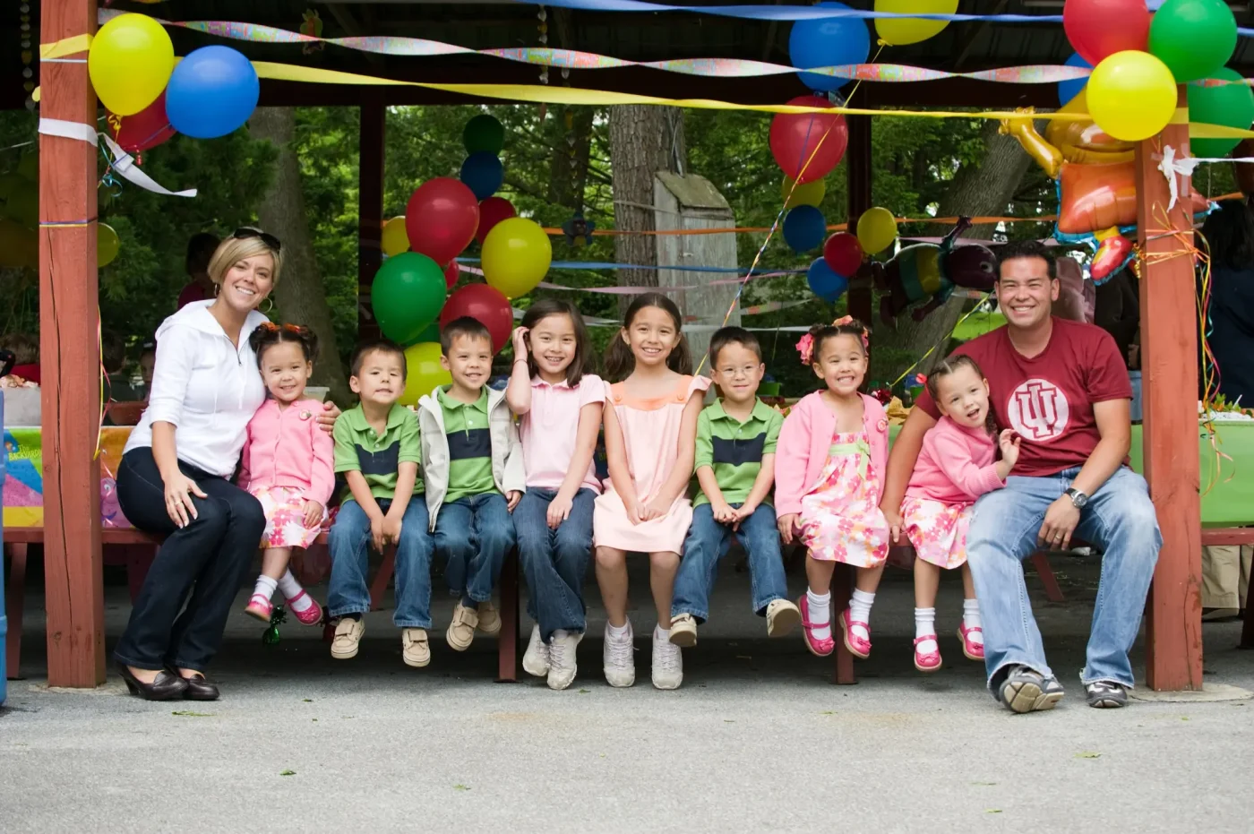 Kate and Jon Gosselin pose with their eight children at a party celebrating the sextuplets