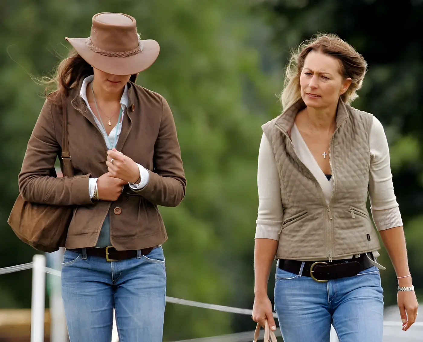 Kate Middleton in blue jeans brown corduroy jacket and matching hat alongside mother Carole Middleton