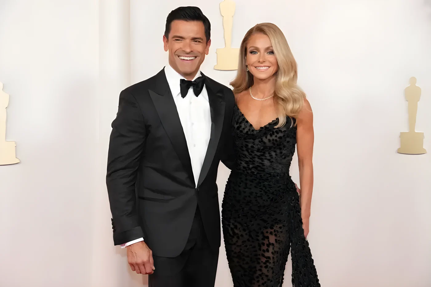 Kelly Ripa and Mark Consuelos glam in matching black outfits for red carpet event