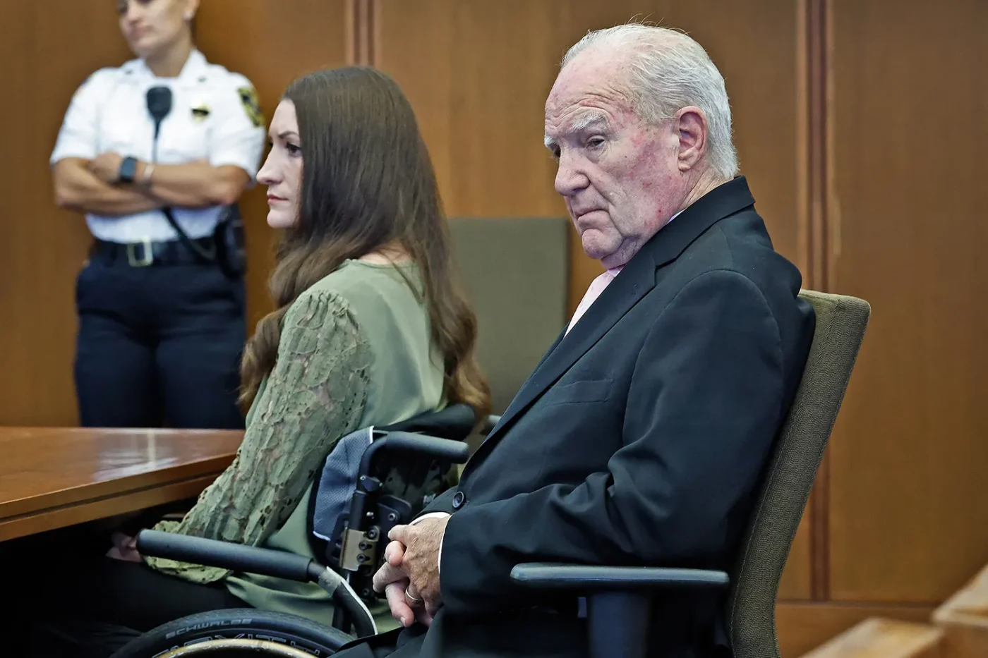 Kevin Reddington, defense attorney for Lindsay Clancy, and Lindsay Clancy look on as Judge William Sullivan (out of frame) instructs the jury to continue deliberating, during Lindsay Clancy