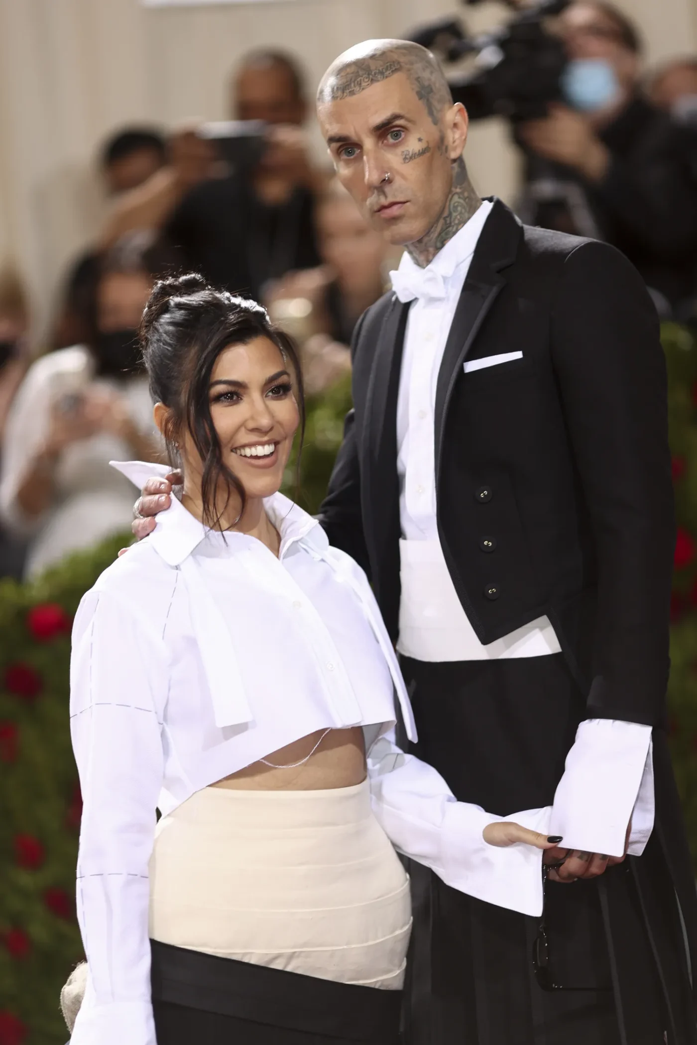 Kourtney Kardashian and Travis Barker wear Thom Browne at the 2022 Met Gala celebrating In America: An Anthology of Fashion