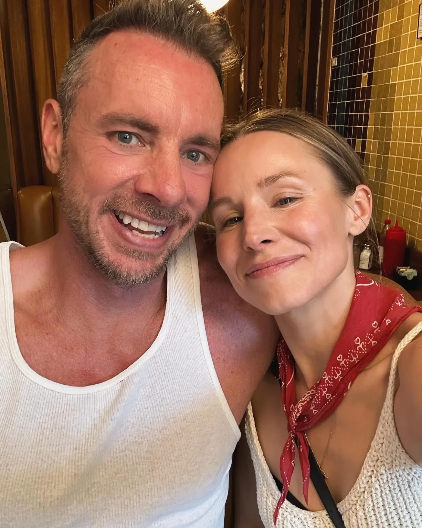 Kristen Bell and Dax Shepard pose for a close-up selfie together.