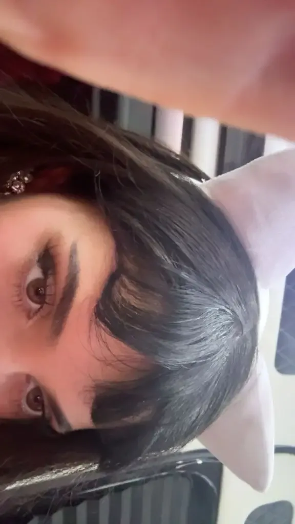 Kylie showed off her wig and diamond earrings and white bunny ears