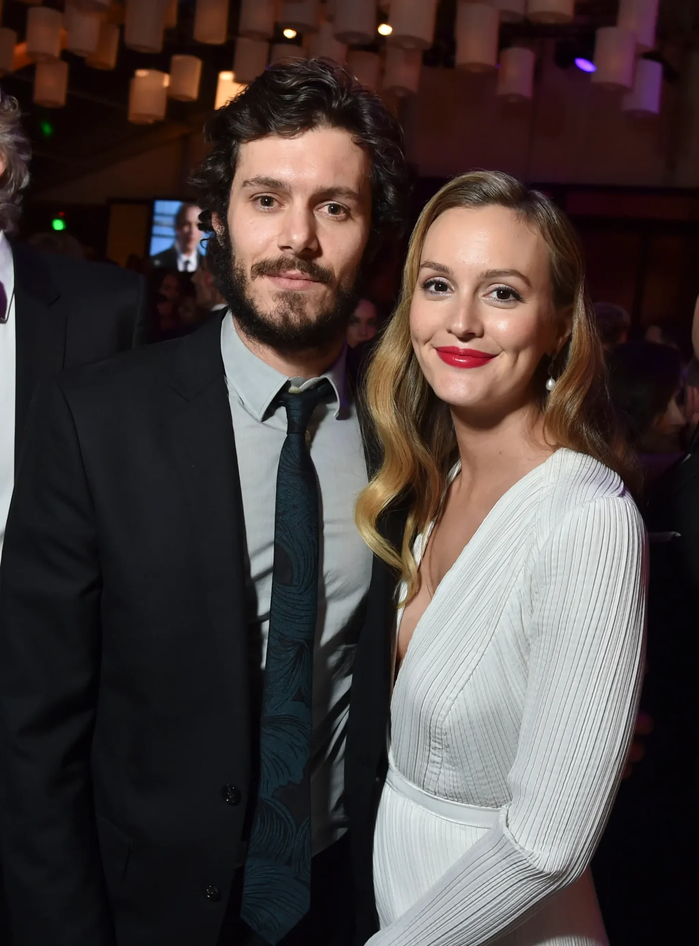 Leighton Meester and Adam Brody pose together at an event.