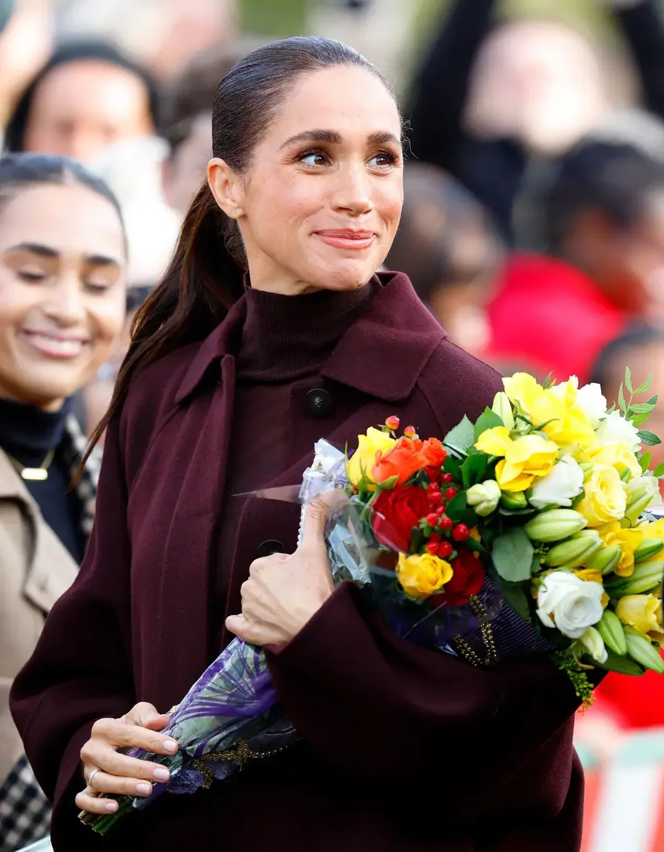 Meghan, Duchess of Sussex arrives at The Community Recording Studio (CRS), a youth and community charity, during her and Prince Harry