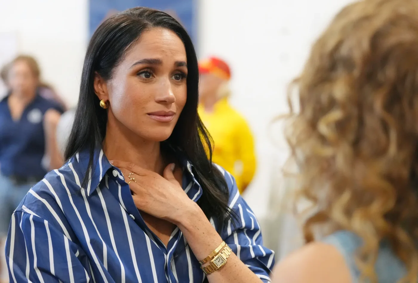 Meghan, Duchess of Sussex, meets a volunteer first responder during a visit to Bondi Surf Bathers