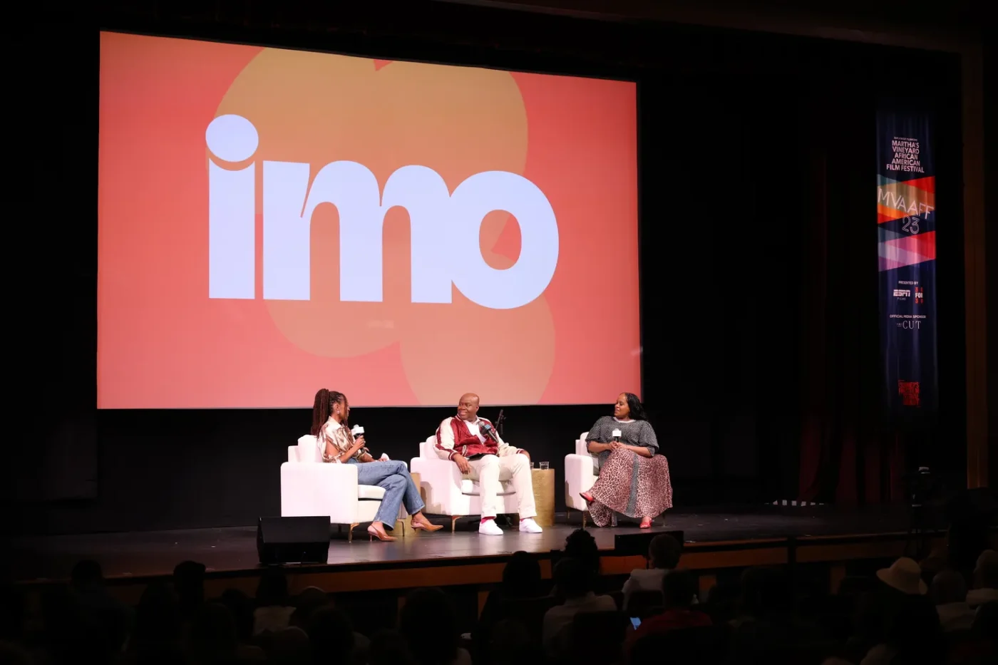 Michelle Obama, Craig Robinson, and Natasha Rothwell taping