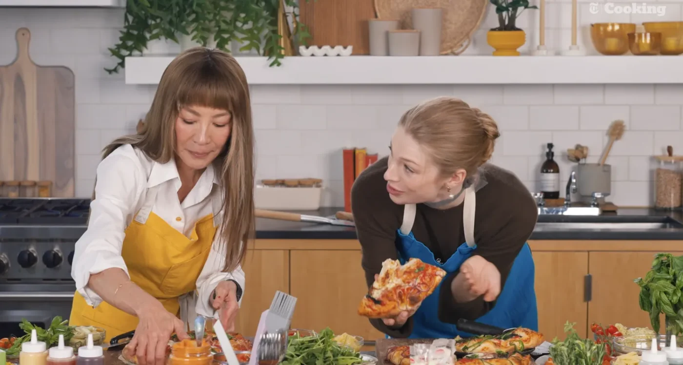 Michelle Yeoh with long straight hair and microbangs with Hunter Schafer