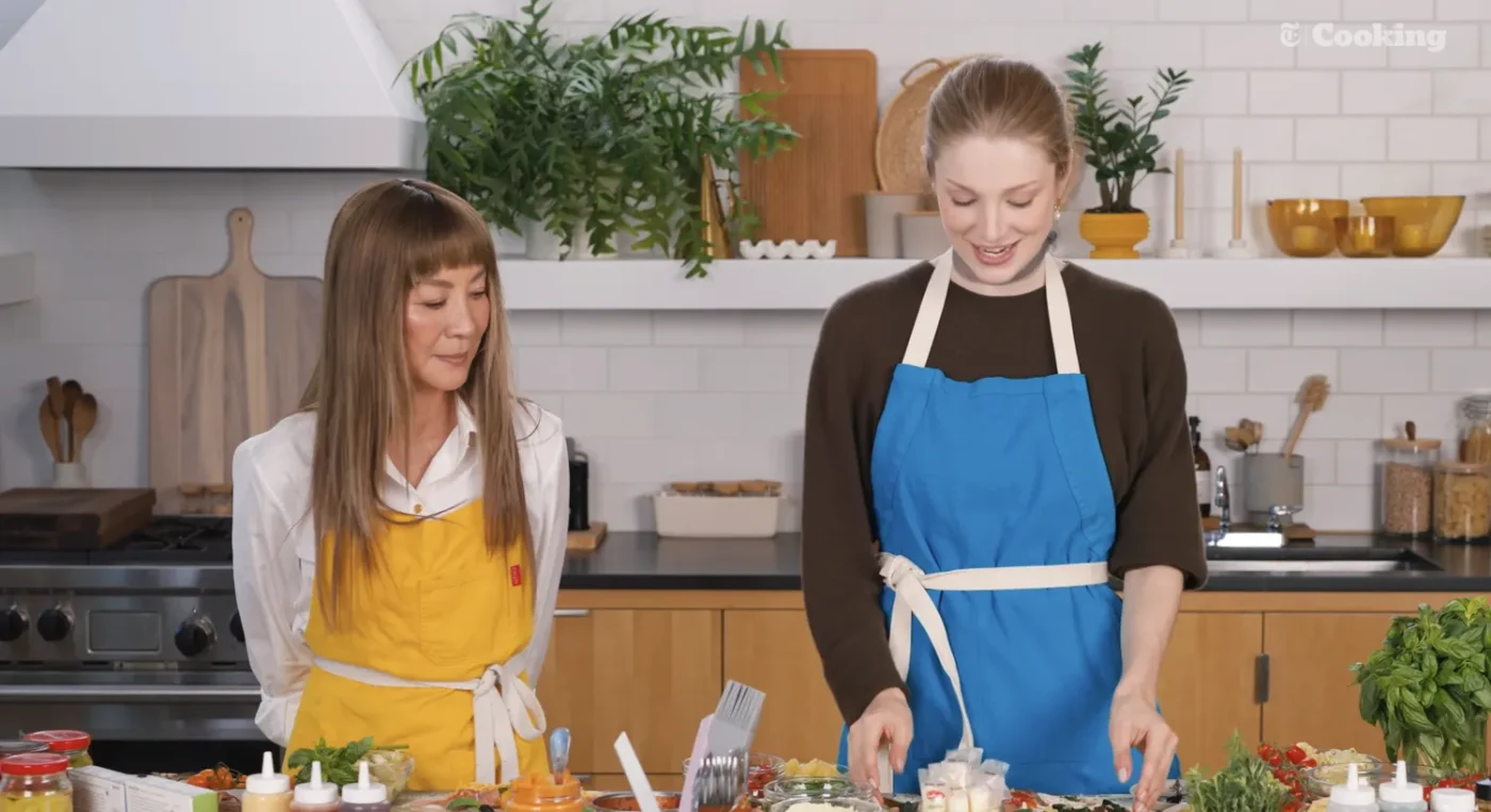 Michelle Yeoh with long straight hair and microbangs with Hunter Schafer