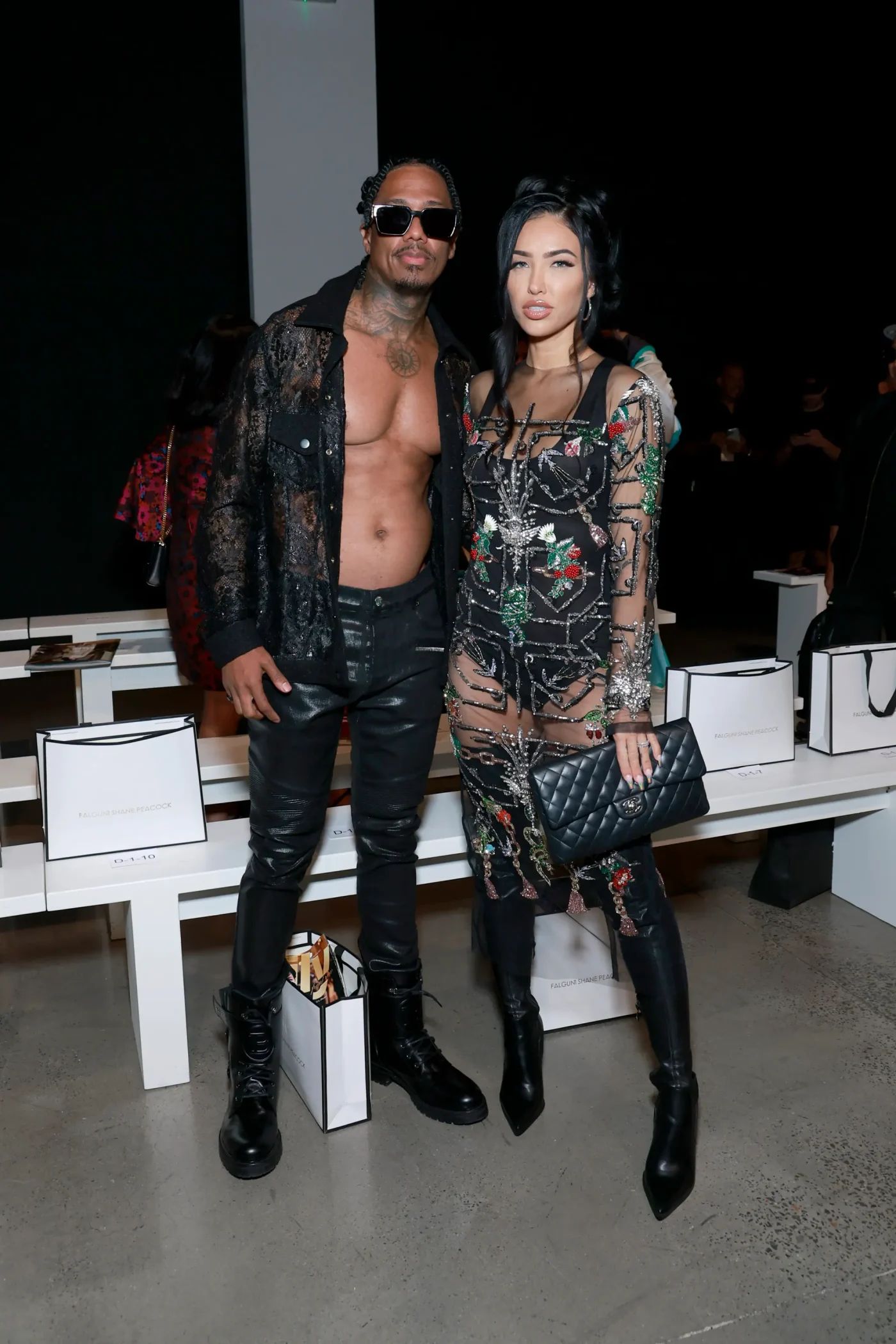 Nick Cannon and Bre Tiesi attend the Falguni Shane Peacock fashion show.