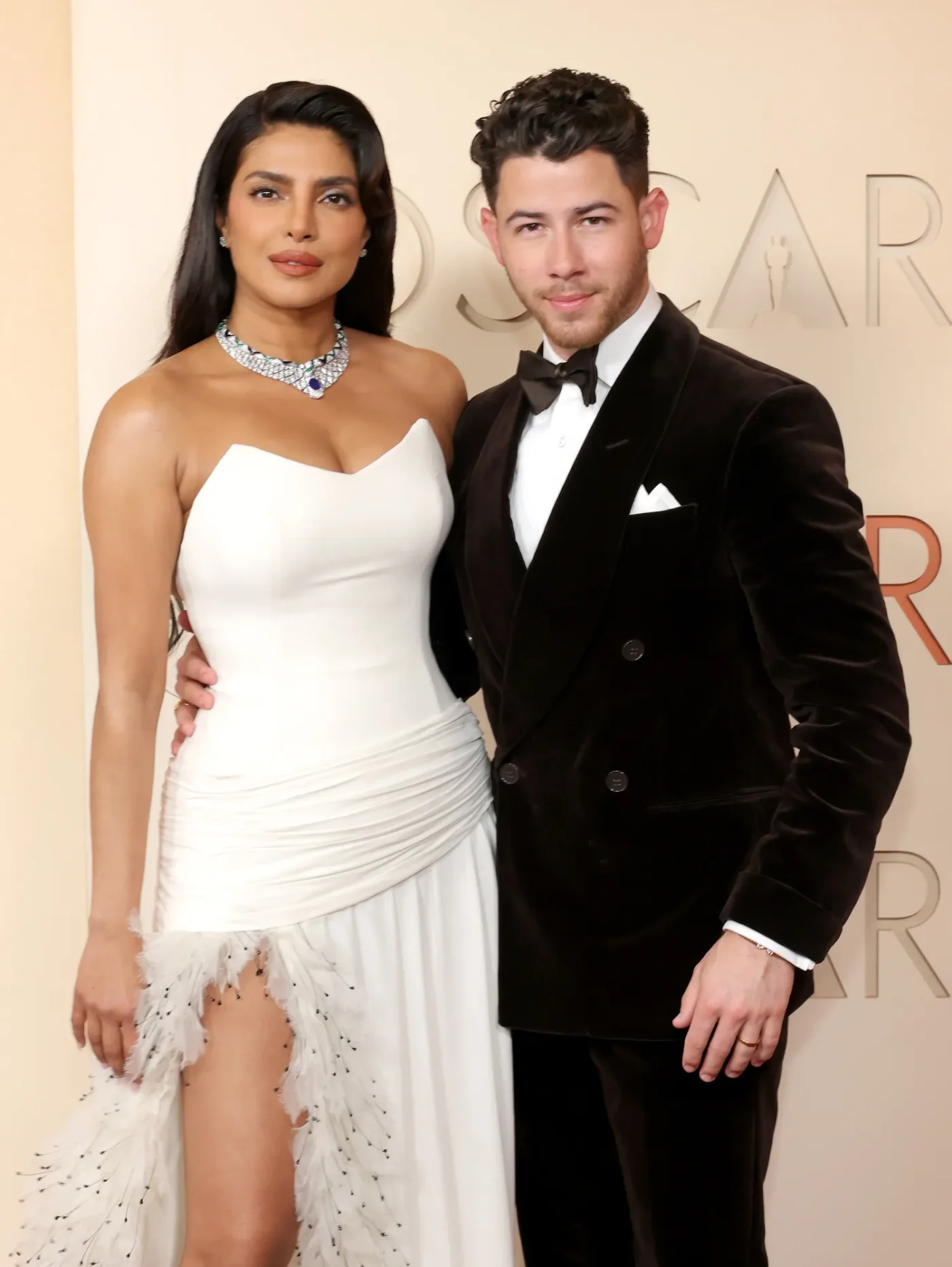 Nick Jonas and Priyanka Chopra standing together