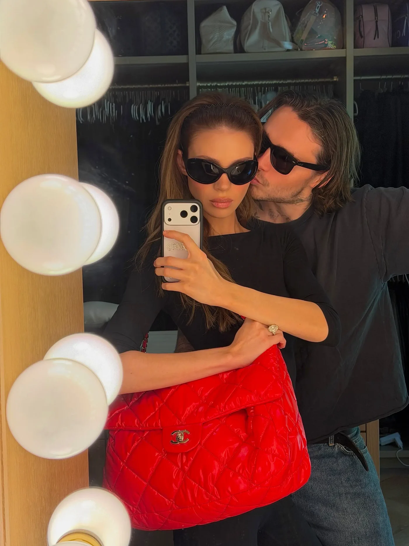 Nicola Peltz and Brooklyn Beckham take a mirror selfie together.