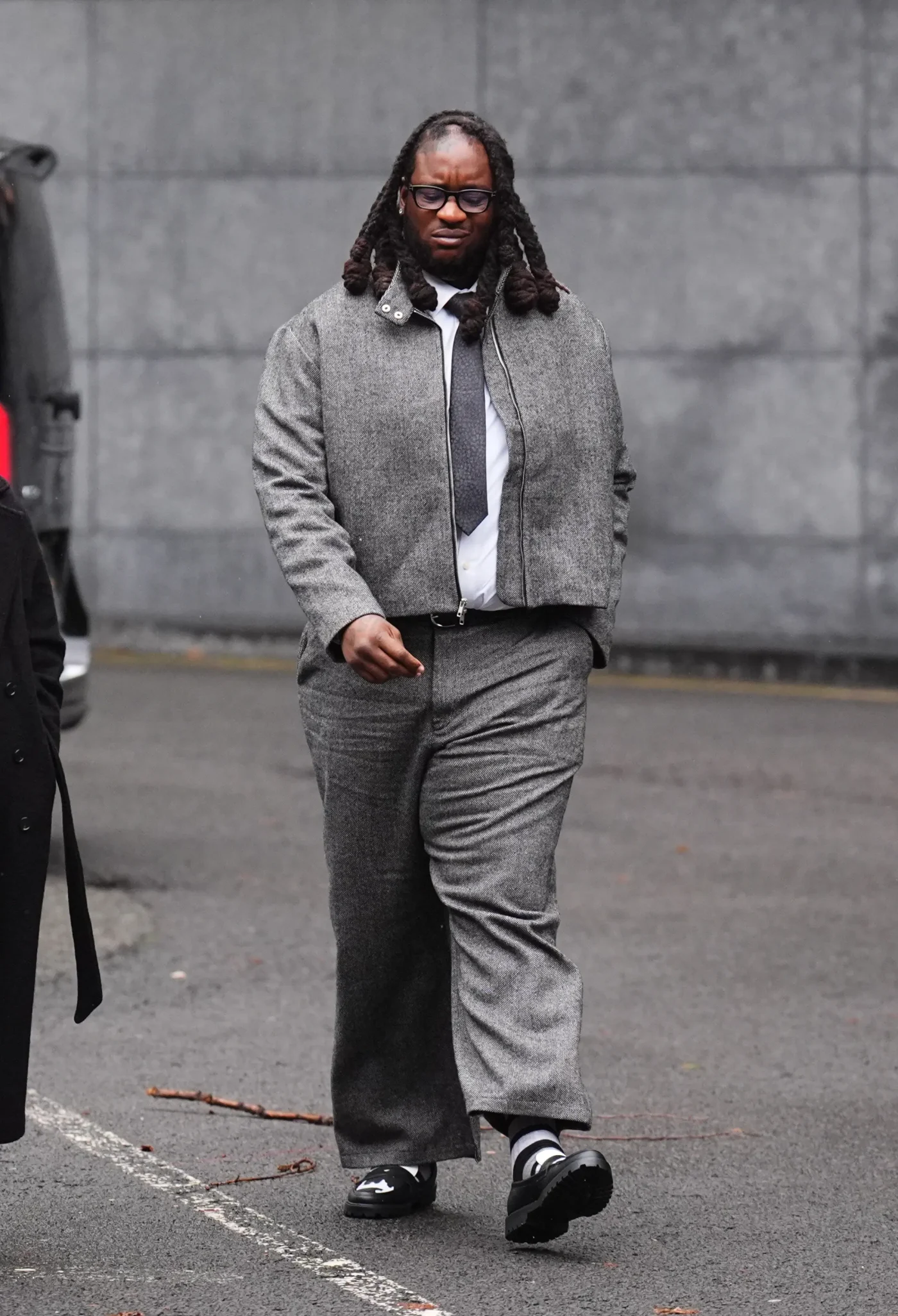 Omololu Akinlolu arriving at Southwark Crown Court.