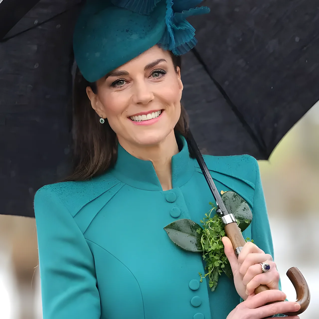 Only Princess Kate could make the humble umbrella look this stylish