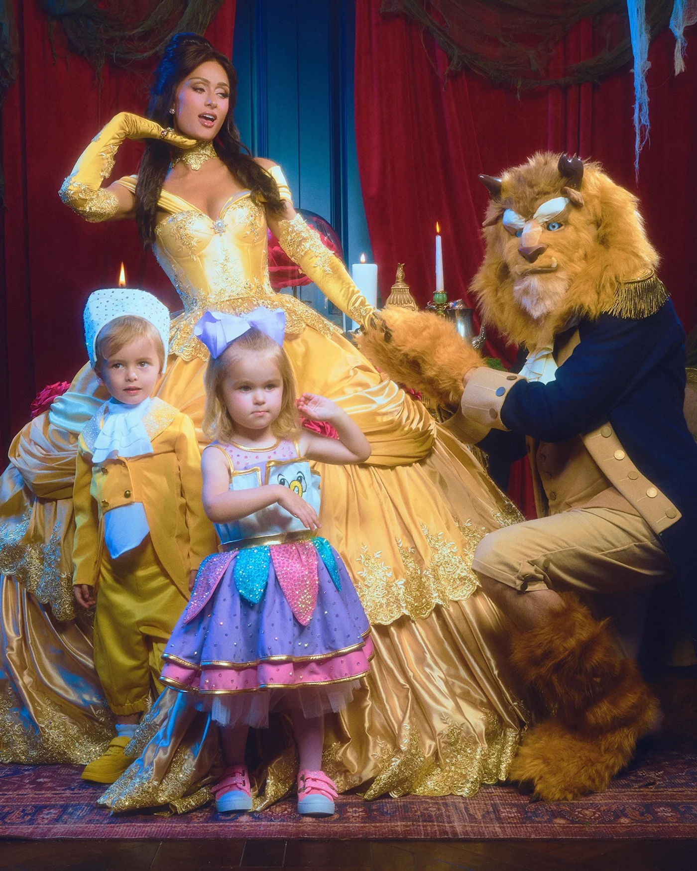 Paris Hilton and family in Beauty and the Beast Halloween costumes.
