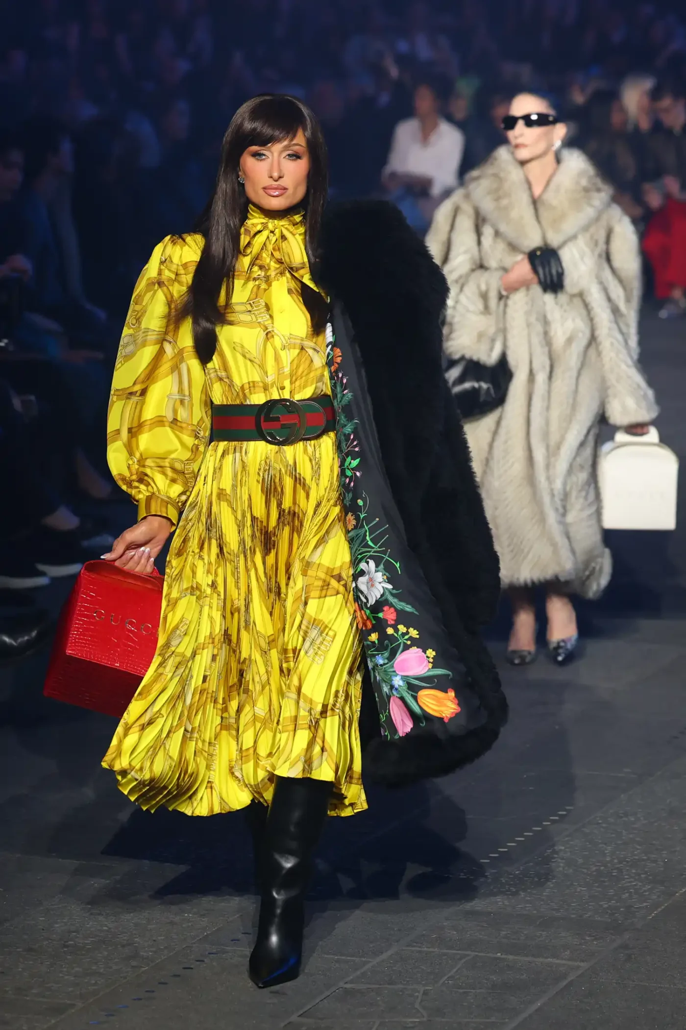 Paris Hilton walks the runway during the Gucci Cruise 2027 collection fashion show at Times Square in New York on May 16, 2026