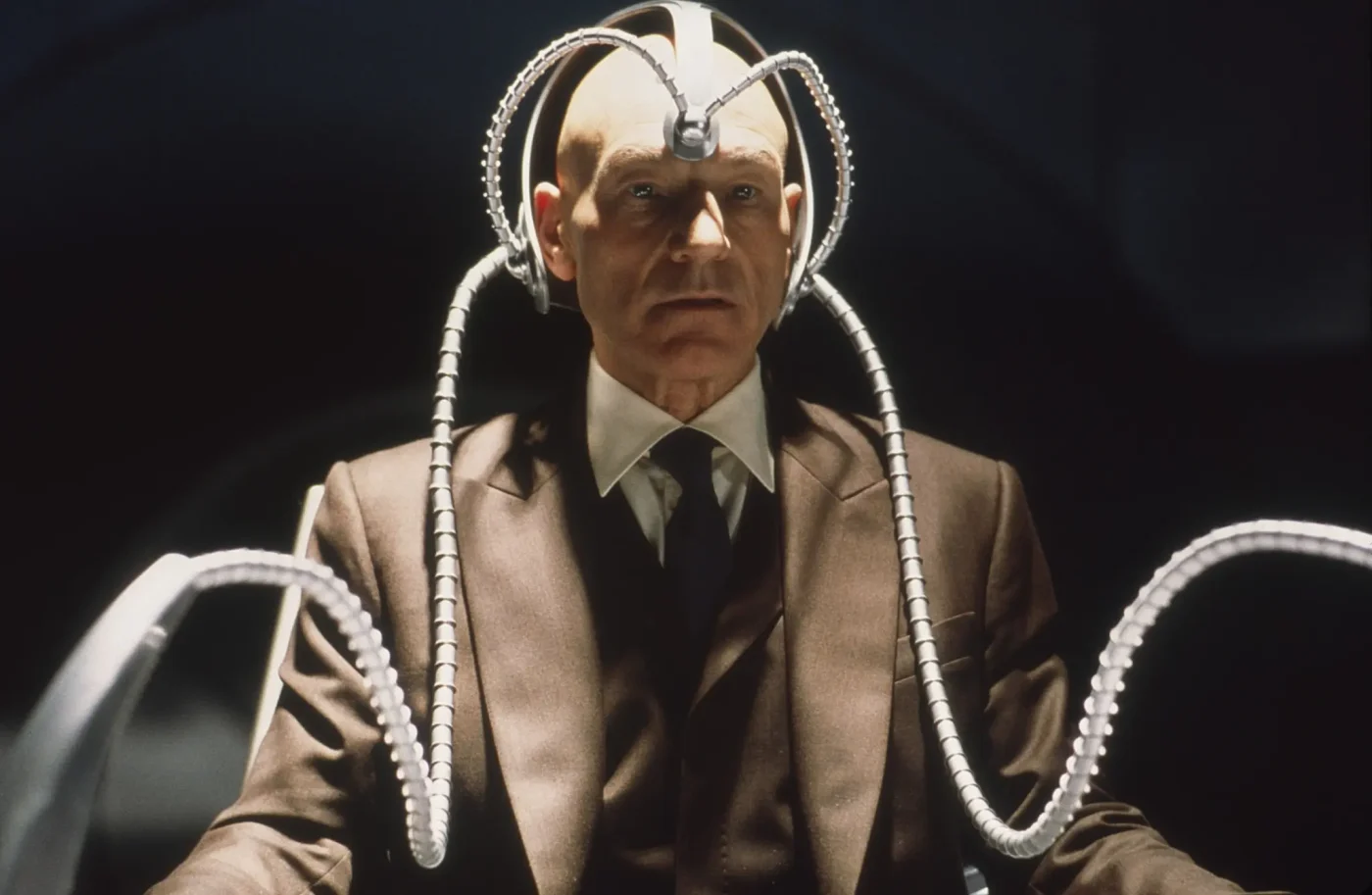 Patrick Stewart as Professor X wearing the Cerebro helmet in X-Men.