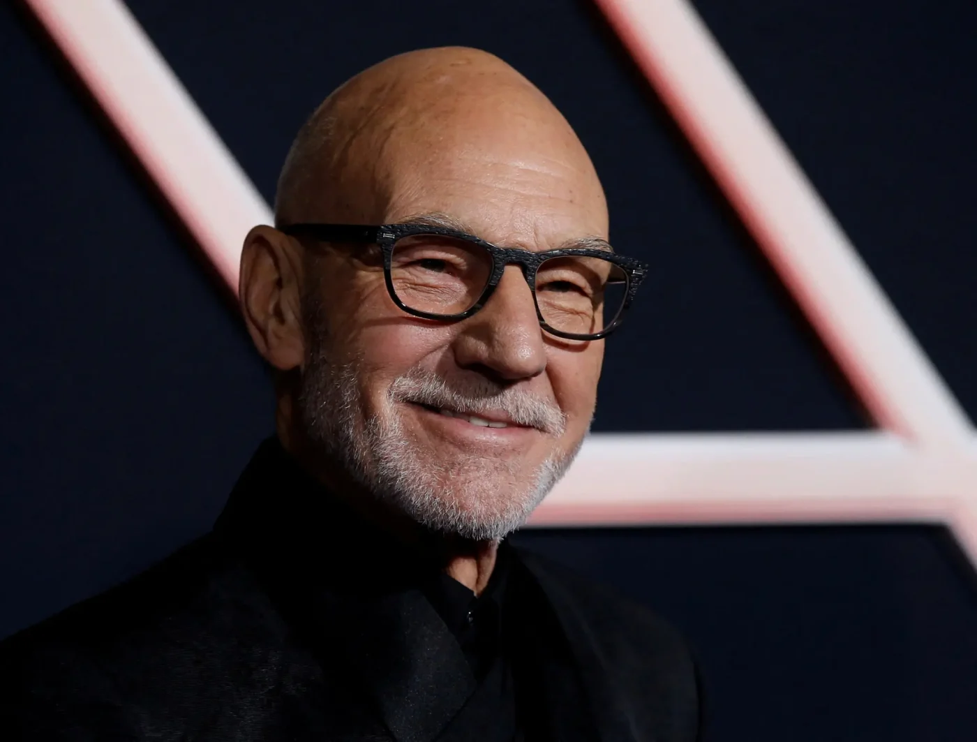 Patrick Stewart smiles at the world premiere of "Charlie