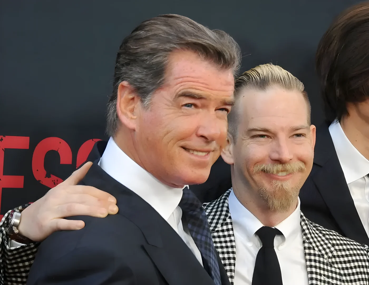 Pierce Brosnan and son Sean with their arms around each other