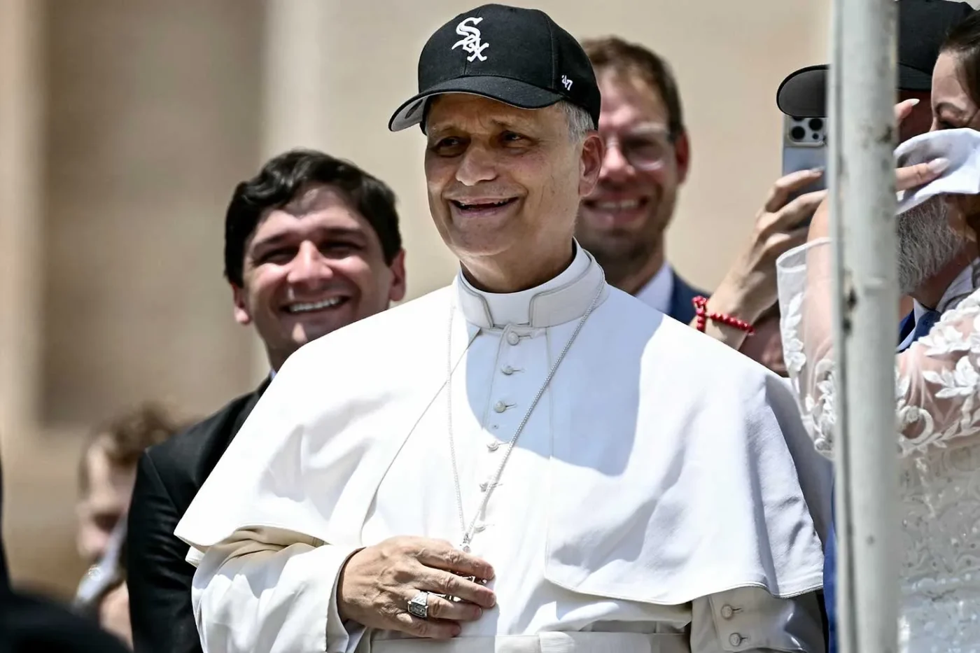 Pope Leo XIV wearing a Chicago White Sox baseball team cap in St Peter
