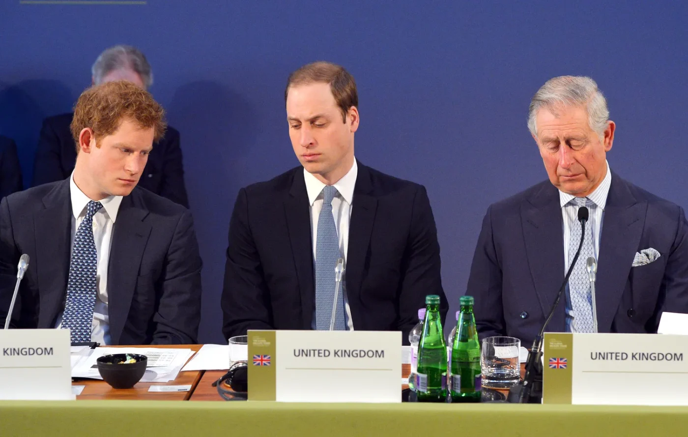 Prince Harry, Prince William, and King Charles on February 13, 2014.