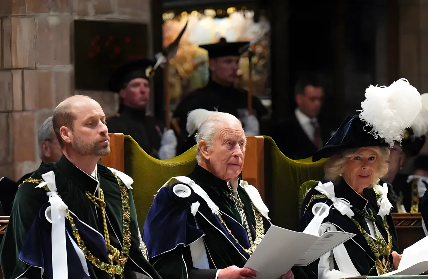 Prince William, King Charles III and Queen Camilla in ceremonial robes at the Thistle Service at St Giles