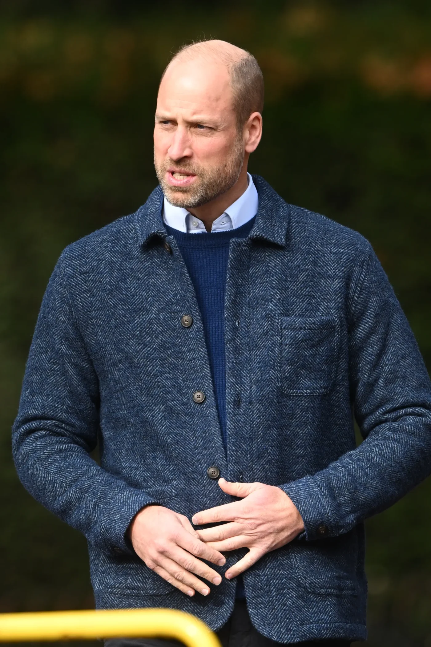 Prince William wearing a blue jacket and sweater at the Earthshot