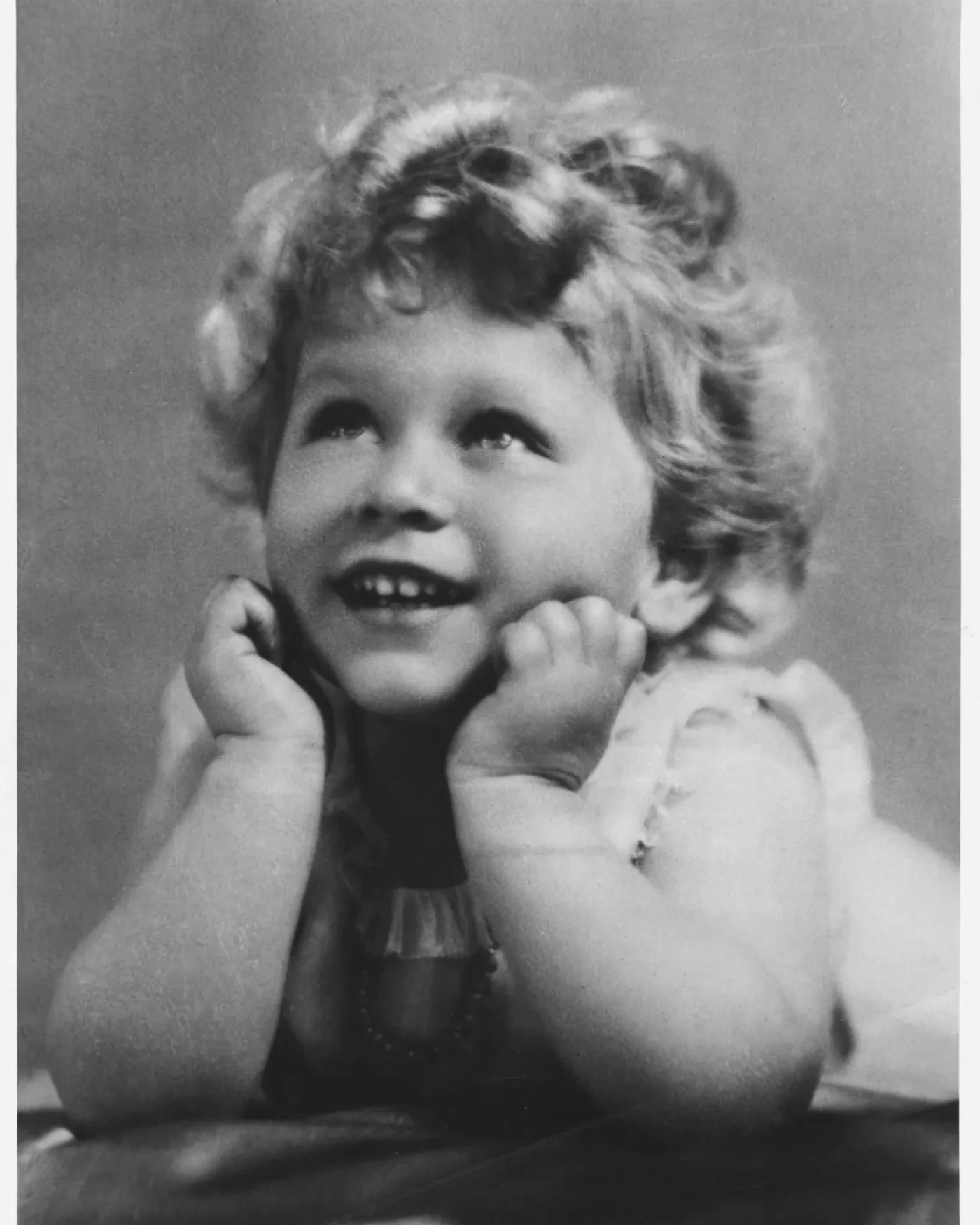 Princess Elizabeth, later Queen Elizabeth II, as a toddler, taken at her London home by Marcus Adams, July 1928.