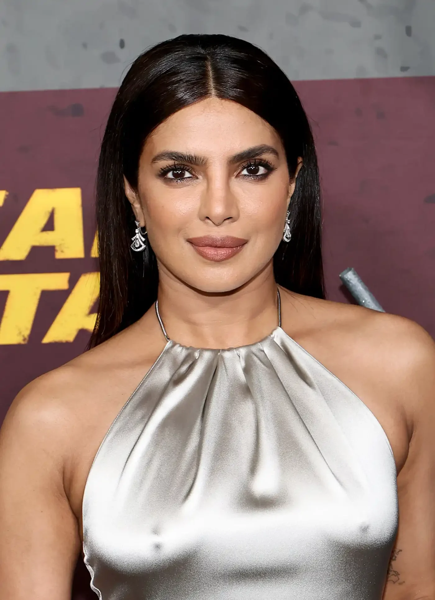 Priyanka Chopra at an event posing for a photo
