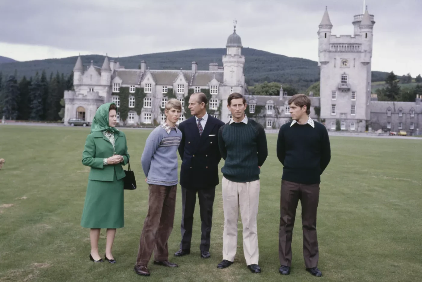 Queen Elizabeth II with Prince Philip, the Duke of Edinburgh (1921 - 2021) and their sons Prince Edward (second from left), Prince Charles (second from right) and Prince Andrew (right) in the grounds of Balmoral Castle in Scotland, UK,