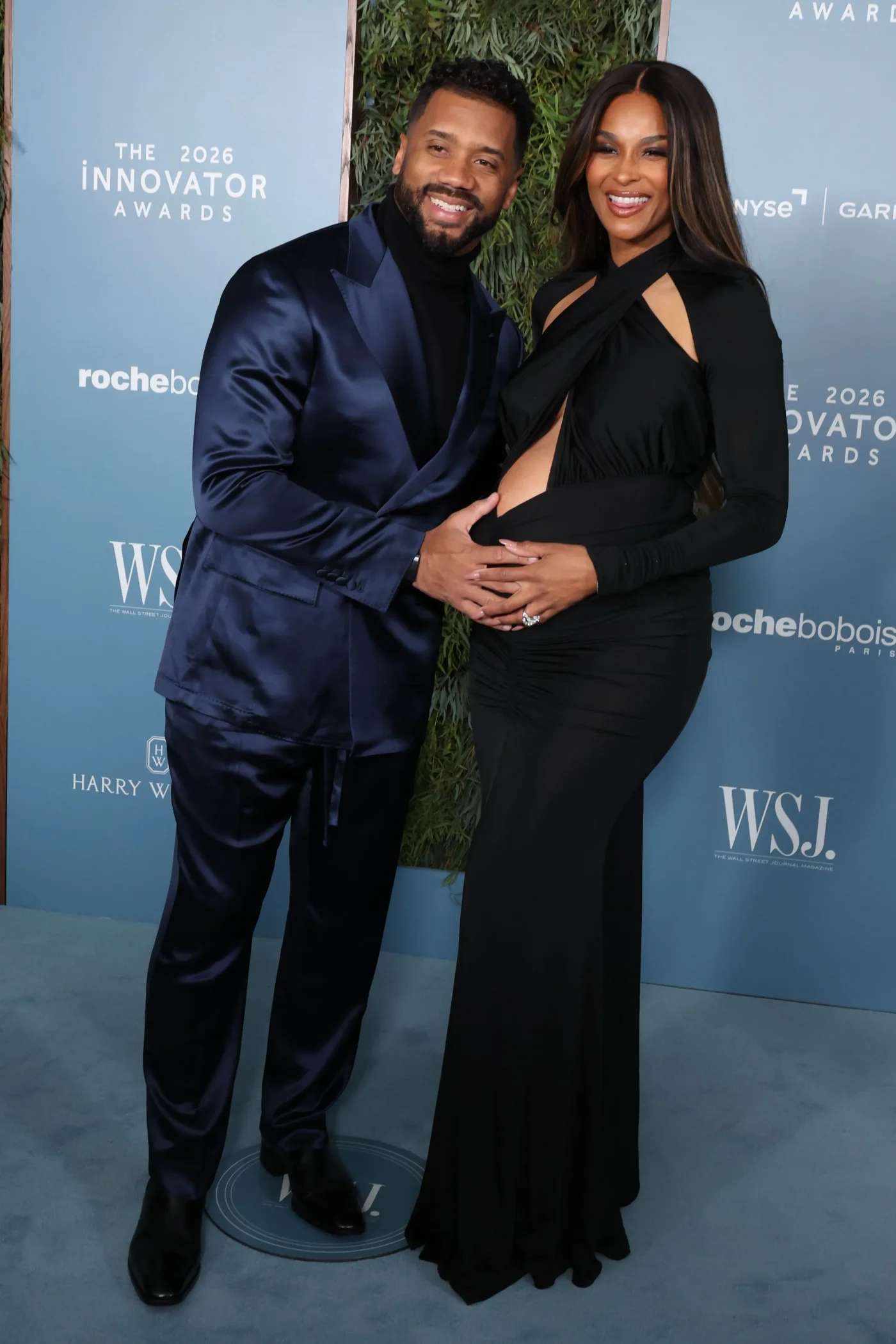 Russell Wilson and Ciara pose together at the WSJ. Magazine Innovator Awards.