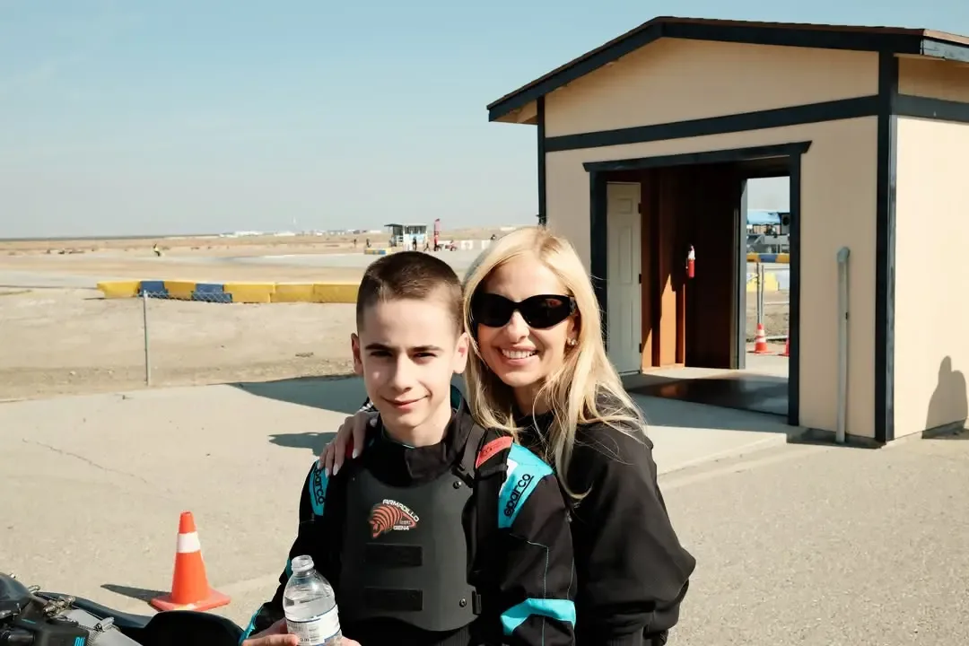 Sarah Michelle Gellar with her son at a racetrack.