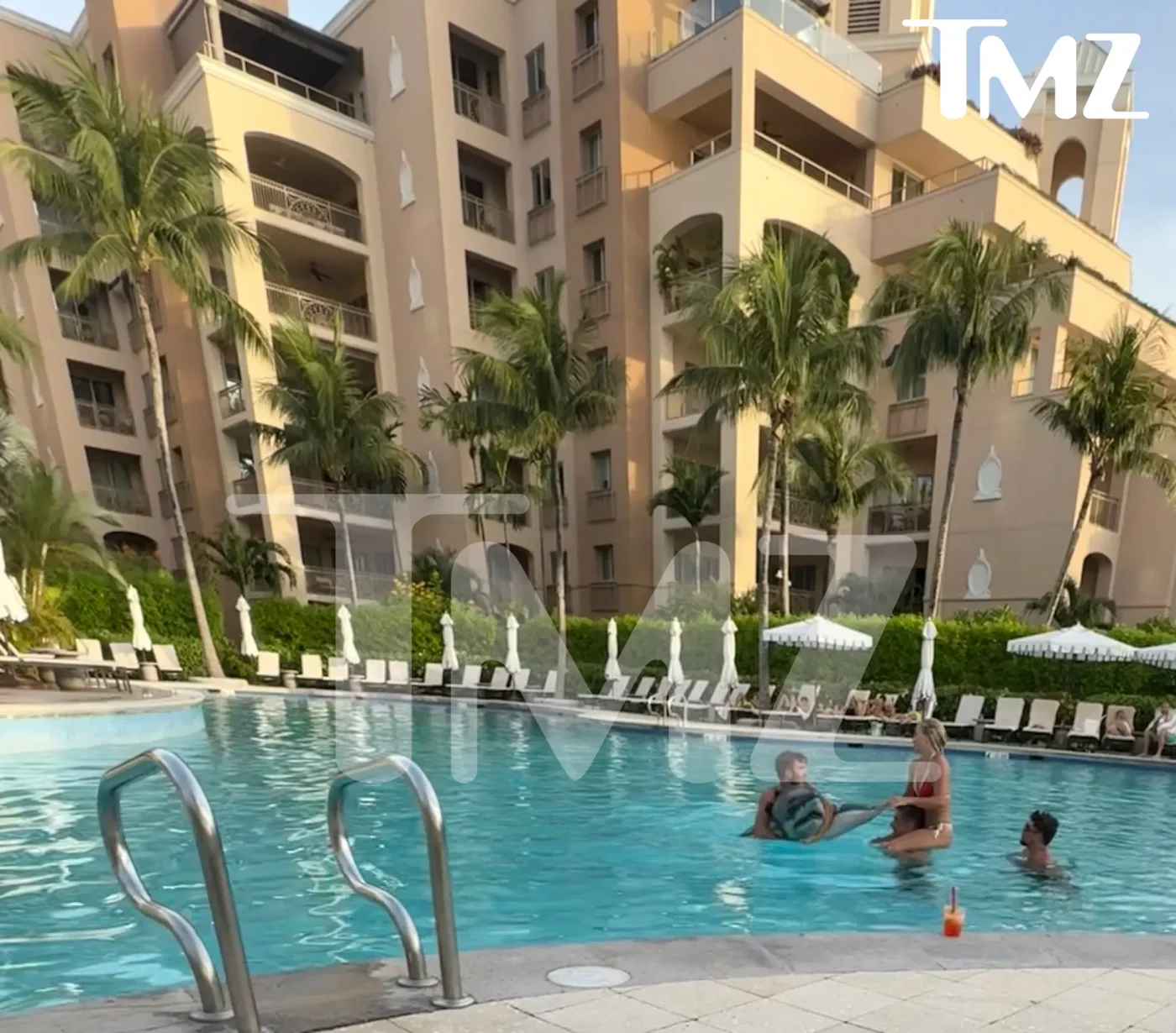 Savannah Chrisley and Jason Galanis in a hotel pool.