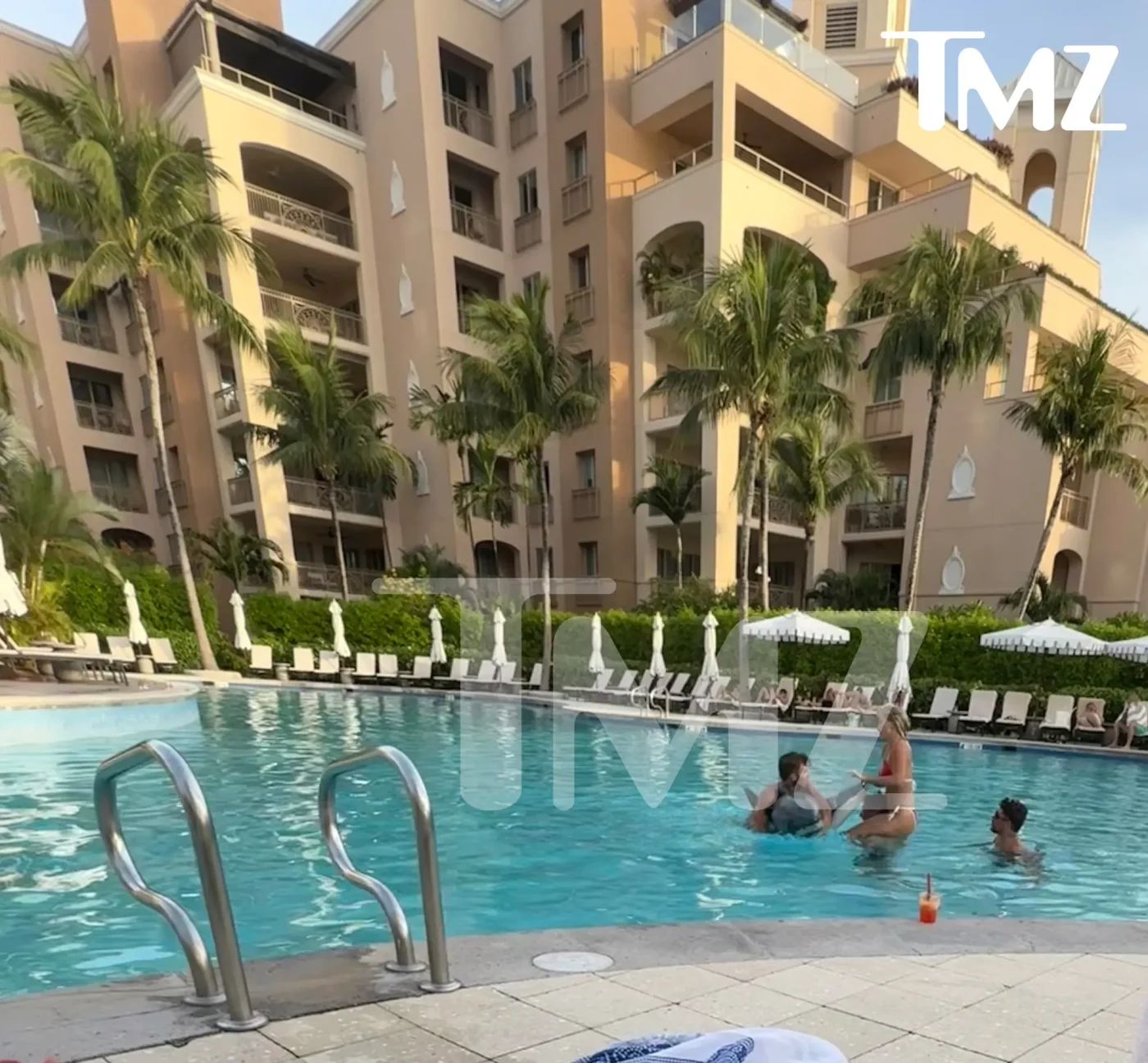 Savannah Chrisley and Jason Galanis in a hotel pool.