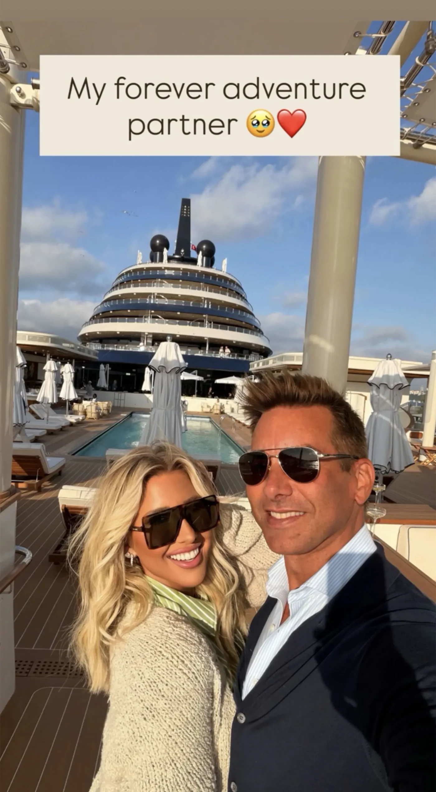 Savannah Chrisley and Jason Galanis take a selfie together on a yacht deck, with text reading