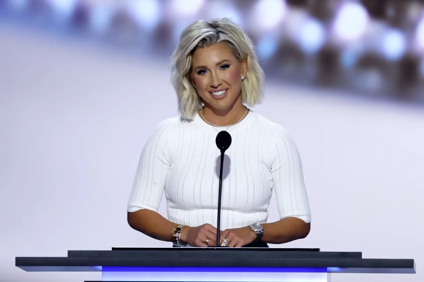 Savannah Chrisley speaks at a podium at the Republican National Convention.