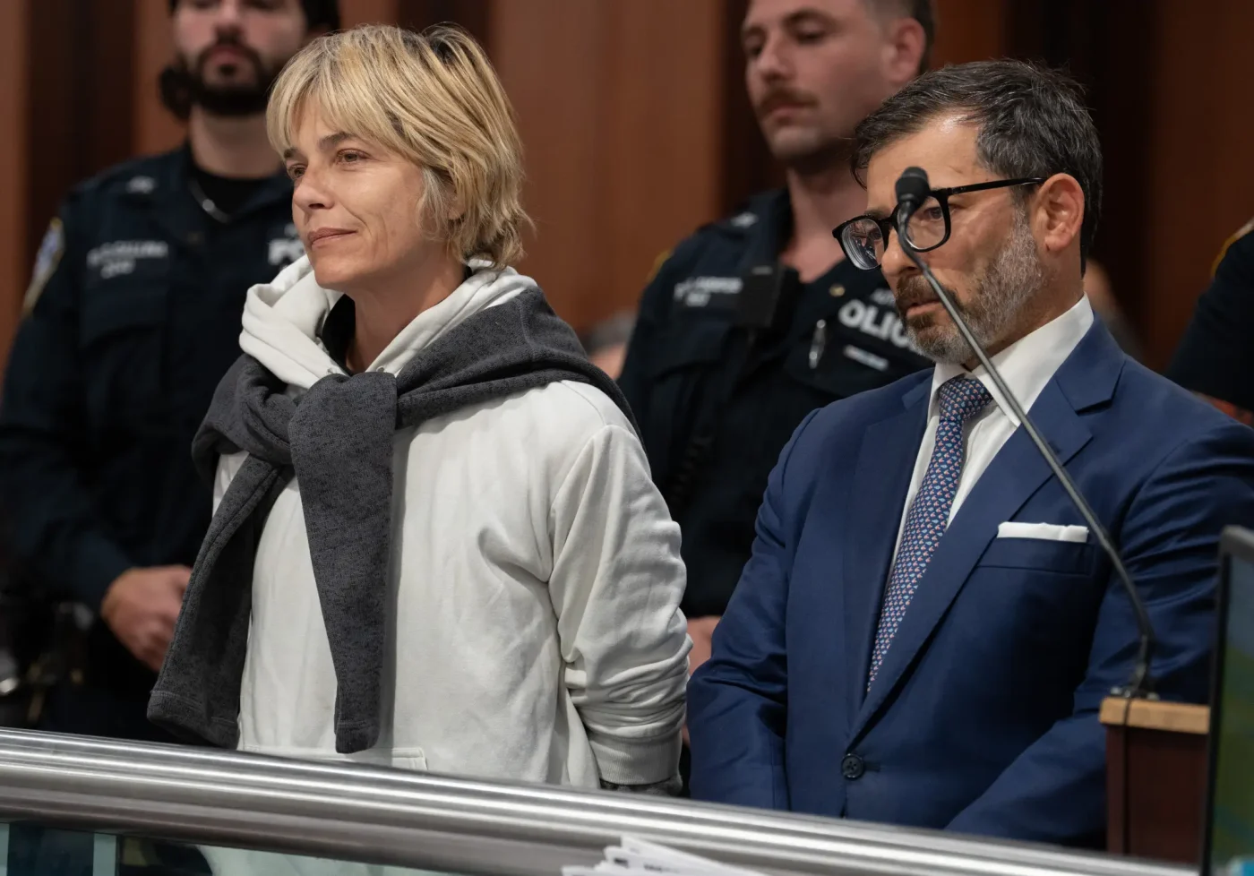 Selma Blair in court with her attorney and police officers.