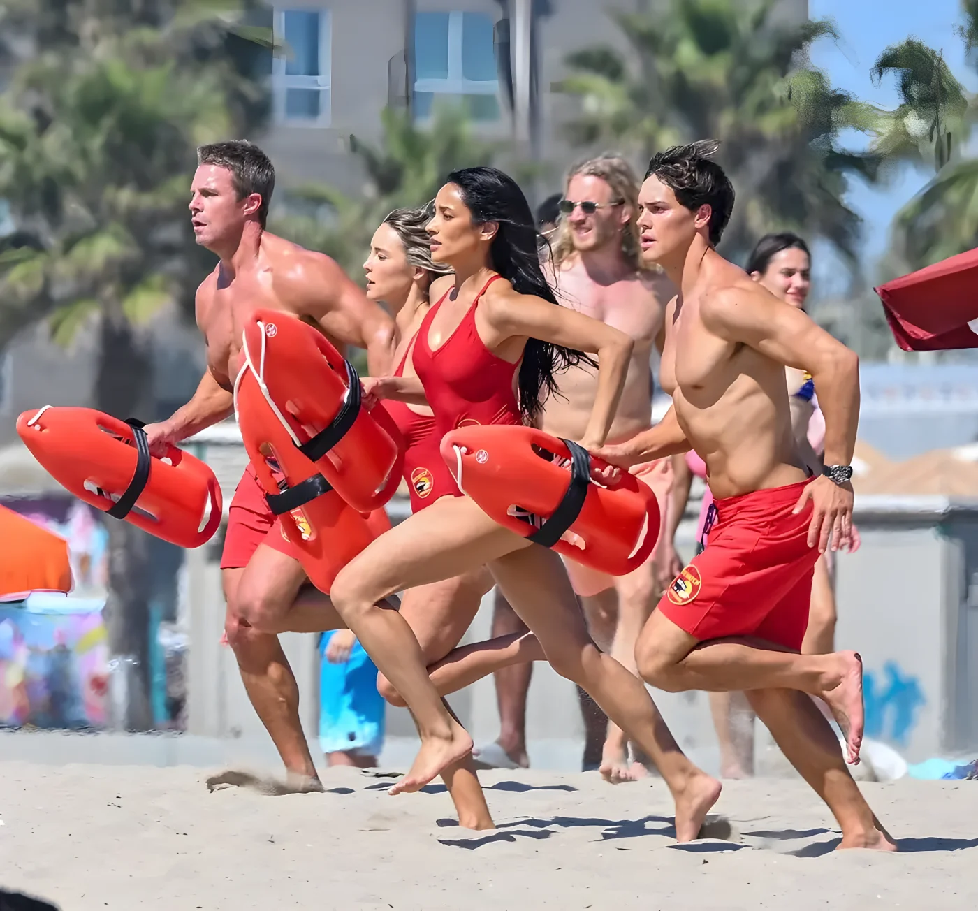Shay Mitchell, Noah Beck, Hassie Harrison, and Stephen Amell are seen on the set of Baywatch on March 18, 2026 in Venice, California.