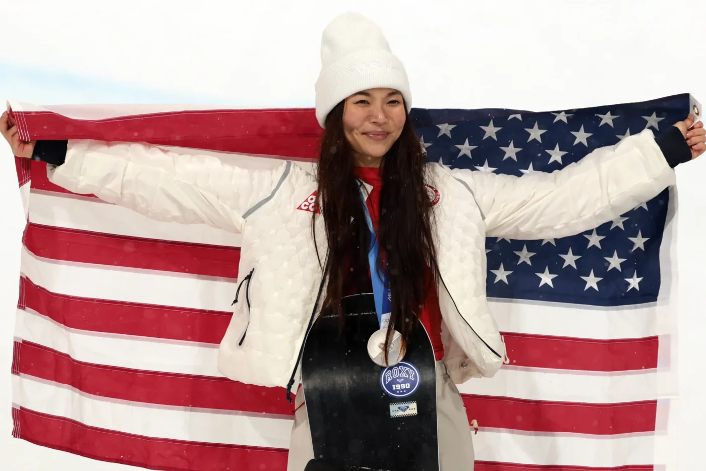 Silver medalist Chloe Kim of Team United States is seen on the podium after the Women’s Snowboard Halfpipe final on day six of the Milano Cortina 2026 Winter Olympic games at Livigno Snow Park on February 12, 2026